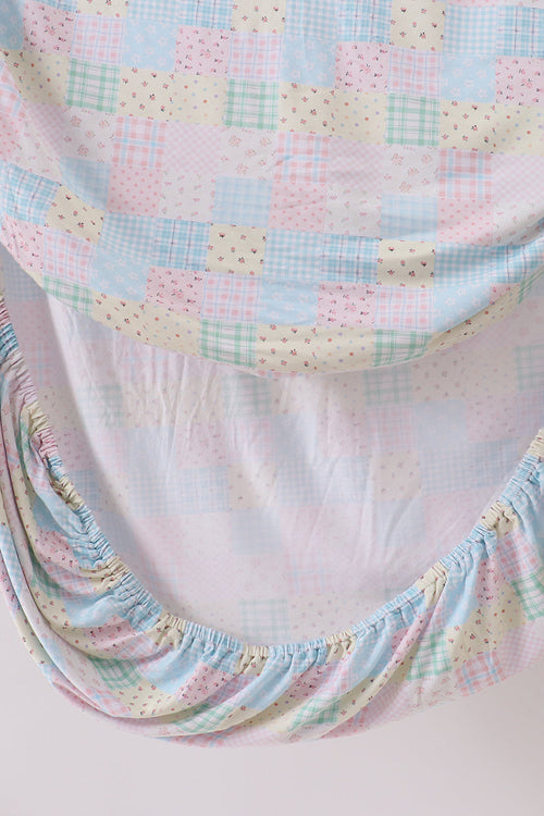 Pink floral checkered bamboo crib sheet